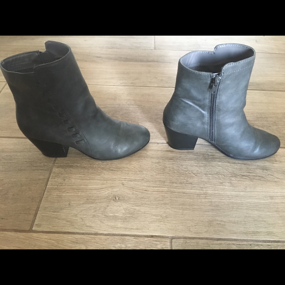 Gray booties. Zips up on the inner side and has detail on the other side.